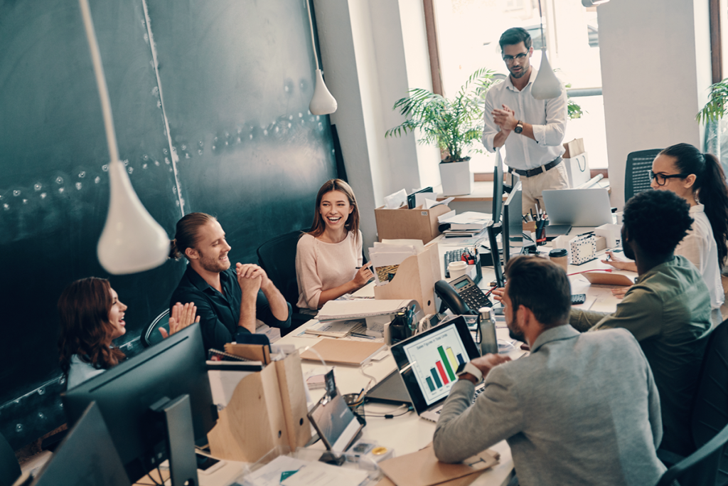 Midsize Business Sales Team Discussing Strategy