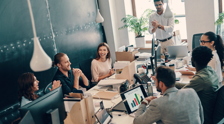 Midsize Business Sales Team Discussing Strategy