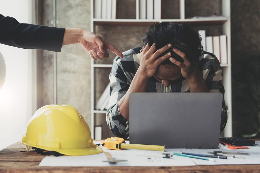 Small business owner holding his head in his hands as the High Cost of Working with Angie's Leads or Angie's List for Advertising. They do not help the business owners other then themselves. Very Bad Investment of your money.