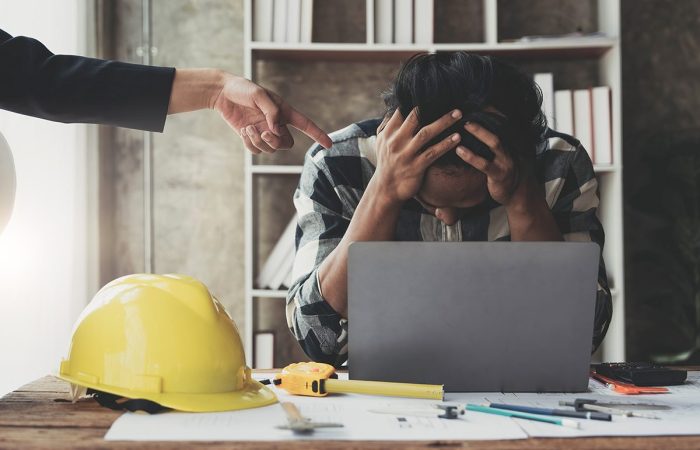 Small business owner holding his head in his hands as the High Cost of Working with Angie's Leads or Angie's List for Advertising. They do not help the business owners other then themselves. Very Bad Investment of your money.